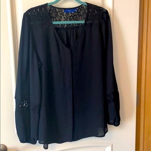 Black blouse with lace accents. Never worn.